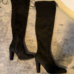 Thigh high black boots